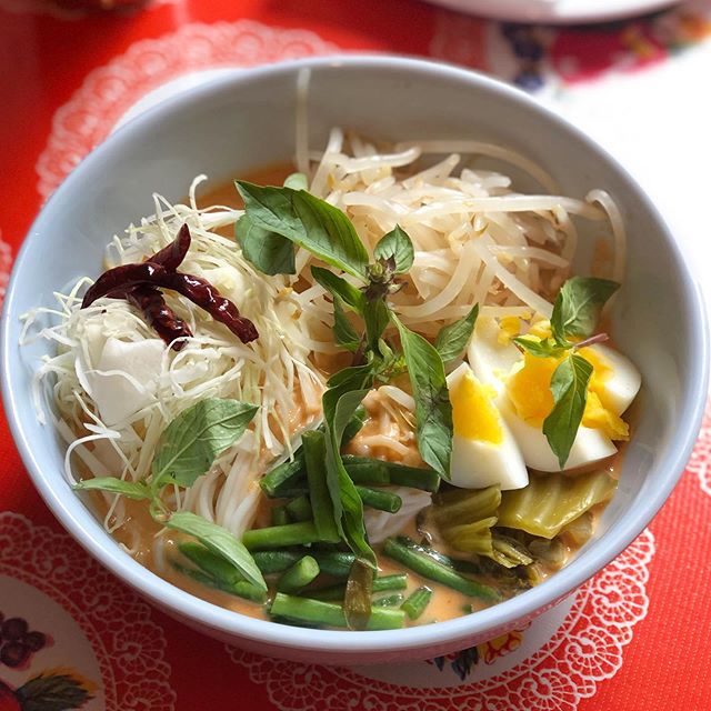 New on the #pokpokpdx & #pokpoknw menus - Khanom Jiin Naam Yaa Plaa-Coconut curry with minced fish and krachai, made with coconut milk. Served over thin rice vermicelli with house pickled mustard greens, bean sprouts, bai menglak (lemon basil), cabbage, long beans and boiled egg. Essential Central Thai dish; very aromatic and herbaceous.